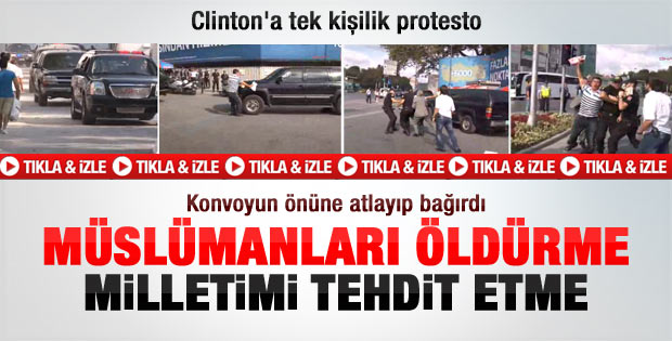 Clinton'un aracının önüne atlayıp protesto etti