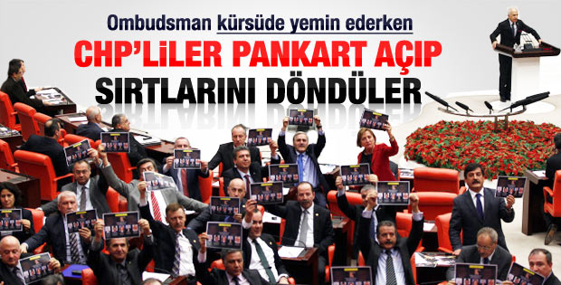 Meclis'te yemin eden Ömeroğlu'na protesto