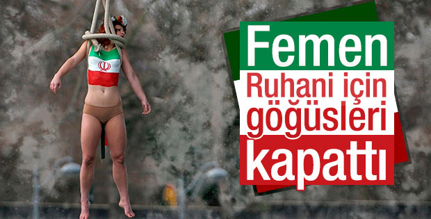 FEMEN Paris'te Ruhani'yi protesto etti