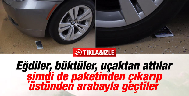 iPhone'u kutusundan çıkarıp arabayla ezdi