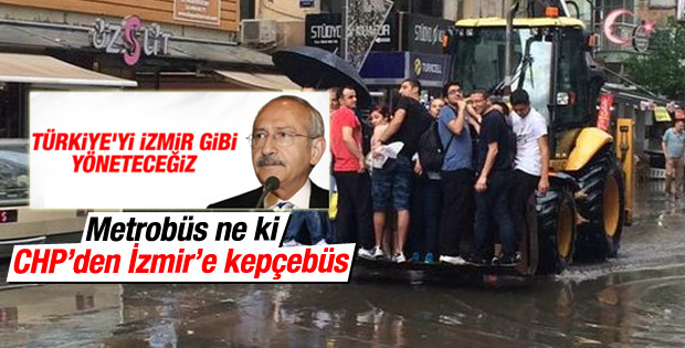 İzmirliler sel sularında kepçeyle taşındı