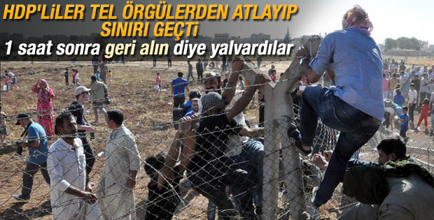Yüzlerce kişi telleri yıkıp Kobani'ye geçti