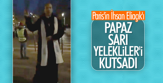 Paris'te göstericileri kutsayan papaz
