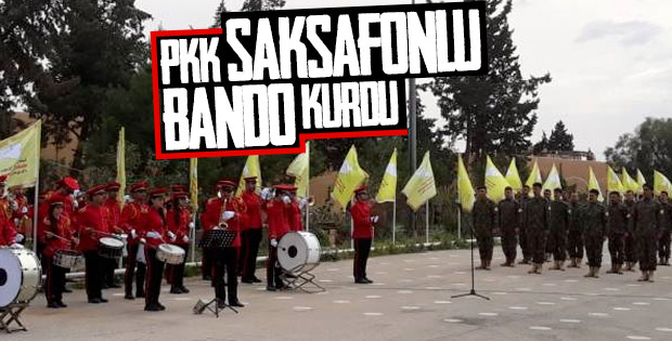 YPG'nin saksafonlu bando takımı