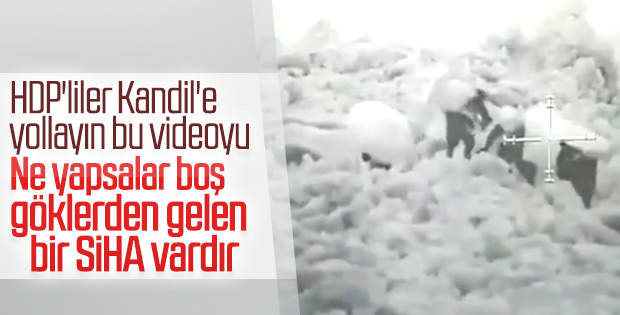 Şemsiyeyle saklanmaya çalışan PKK'lı teröristler kamerada
