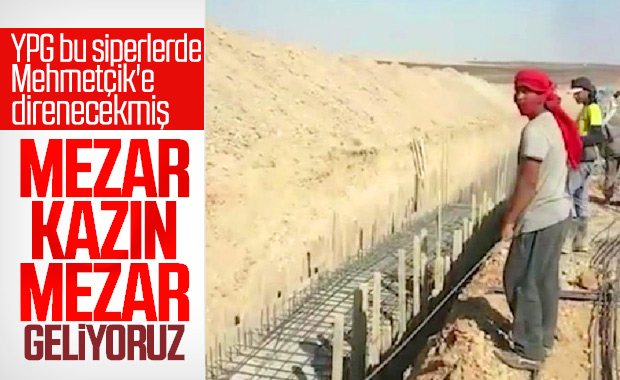 YPG'li teröristler siper kazmaya başladı