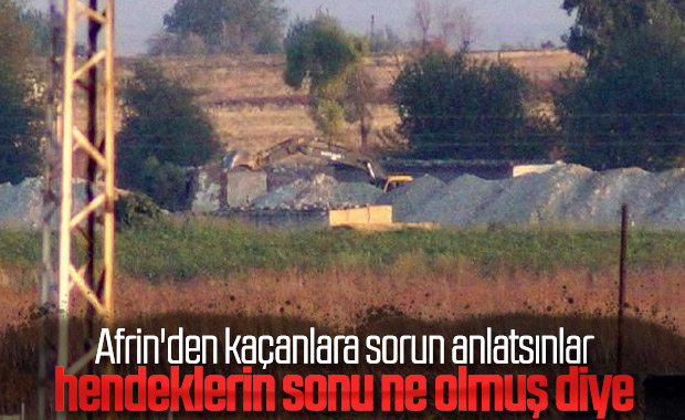 PKK/PYD'li teröristler hendek kazmayı sürdürüyor