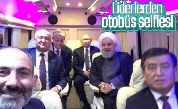 Putin ve Ruhani'den otobüste selfie