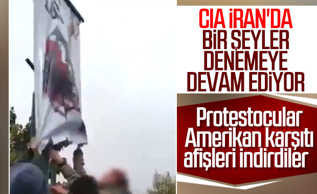 İran'da Amerika'ya tepki için verilen afişi indirdiler
