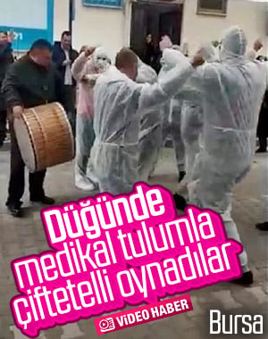 Bursa'da sokak düğününe medikal tulum giyerek katıldılar