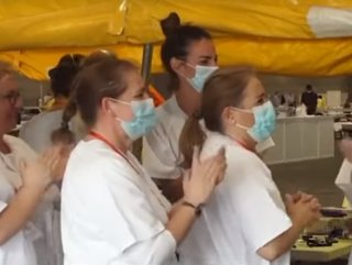 Madrid'de iyileşen koronavirüs hastasına alkışlı destek