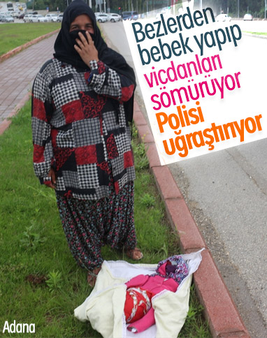 Adana'da bez bebekle dilencilik yapan kadın yakalandı