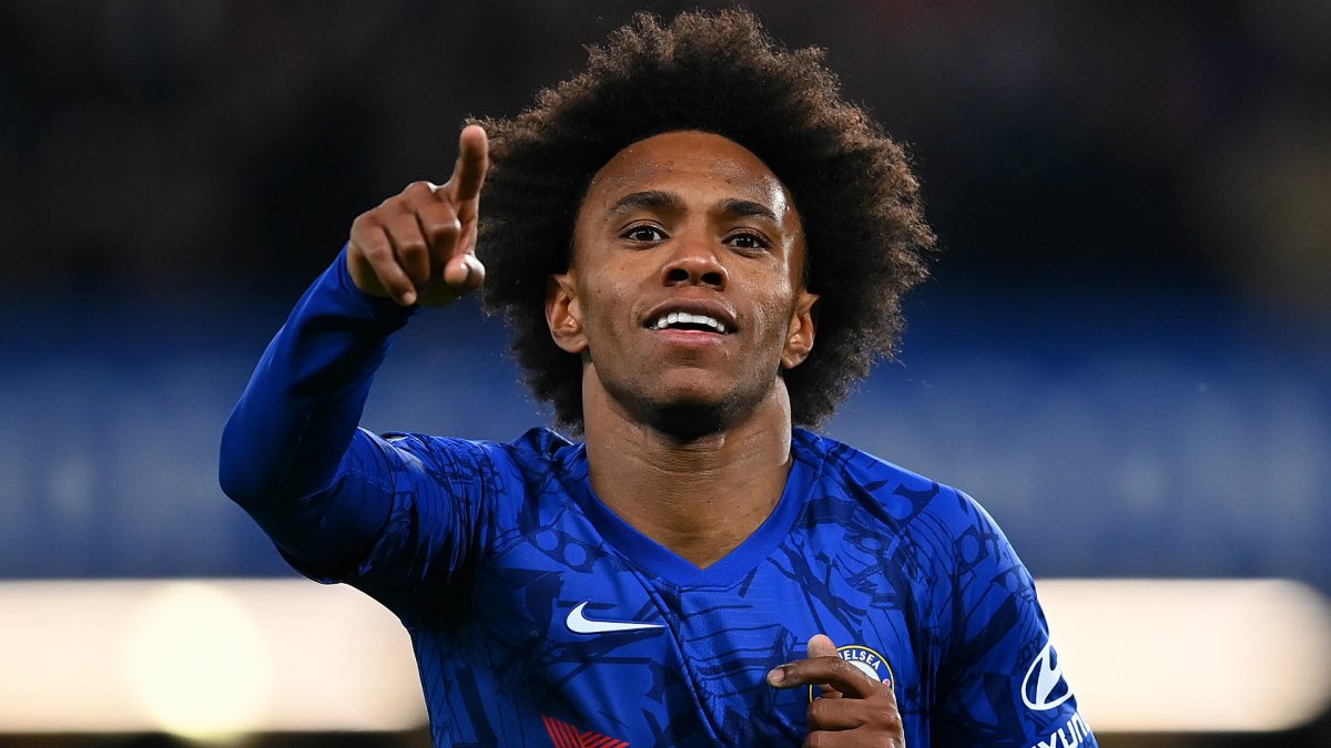  Willian celebrates scoring a goal for Chelsea, amid speculation about his future at the club.
