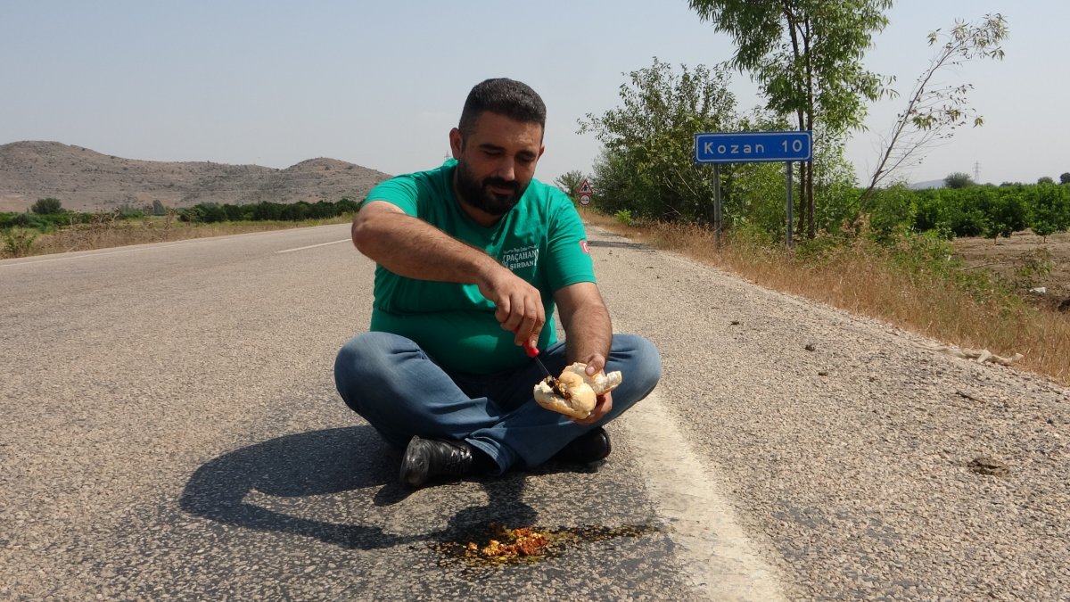 Adana artisans cook eggs with sausage on asphalt # 4