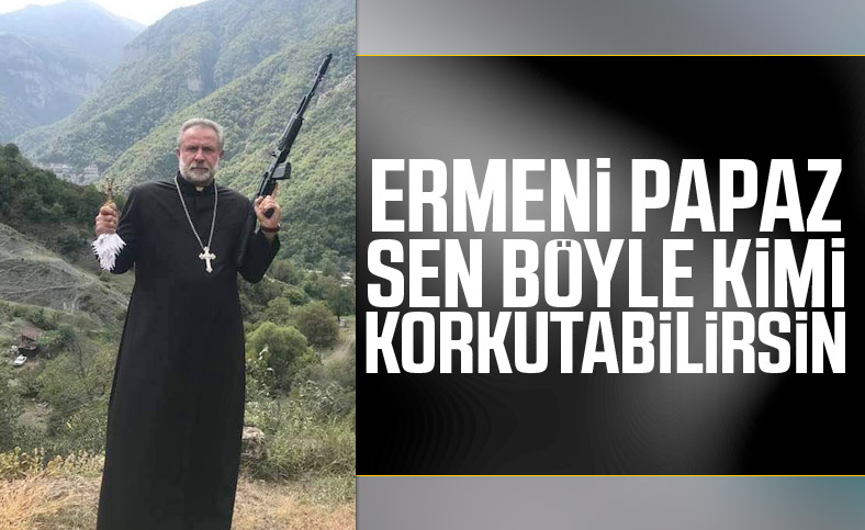 Ermenistan'dan silahlı ve haçlı papaz paylaşımı
