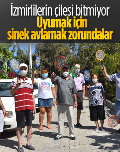 İzmir'de kanalizasyonsuz mahallede raketlerle sinek avına çıkıyorlar