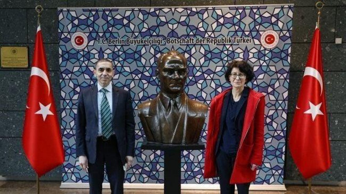 Posing with Atatürk bust by Özlem Türeci and Uğur Şahin #1