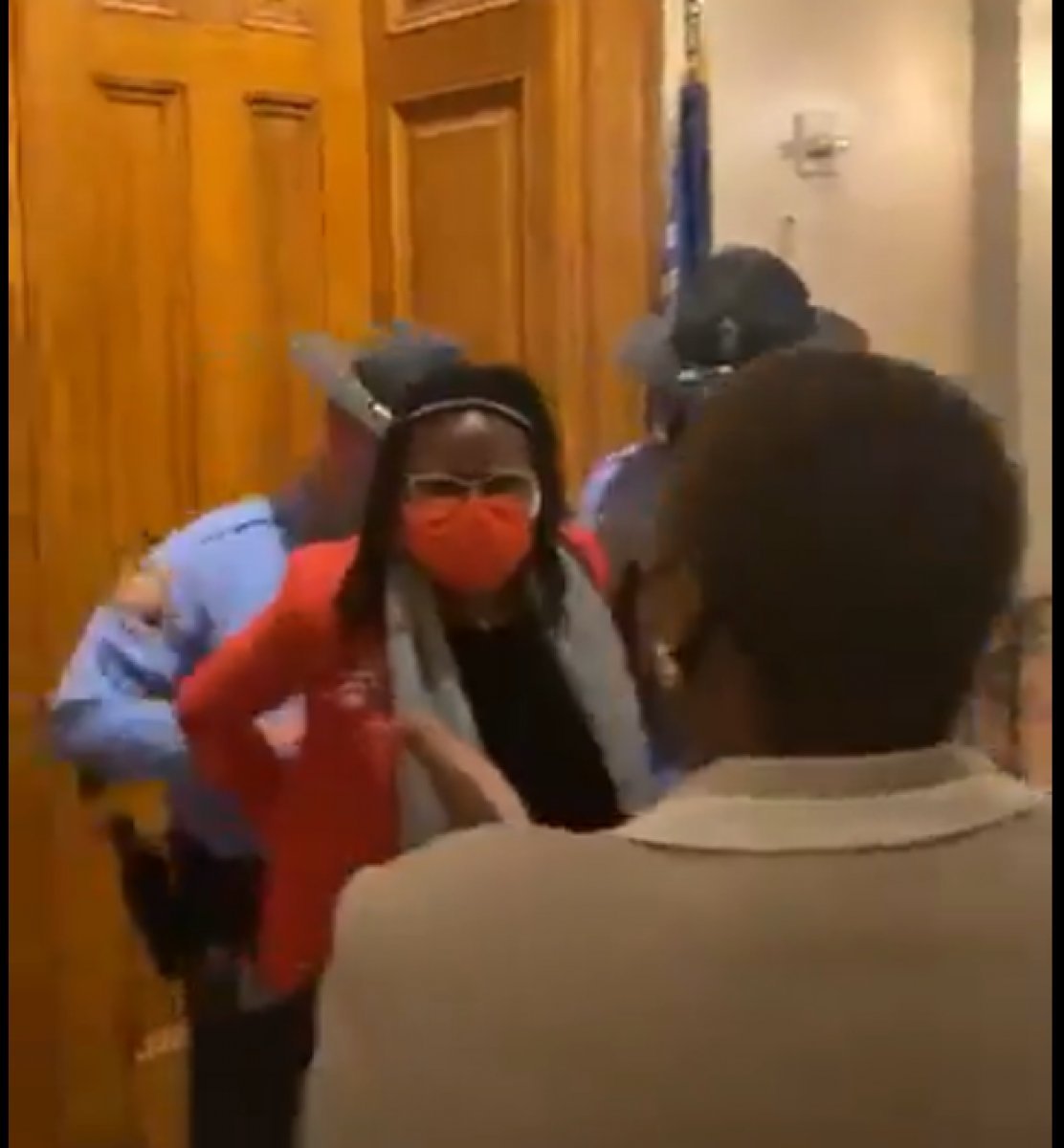 Reverse handcuffs to black lawmaker going to the governor's office in the USA #4