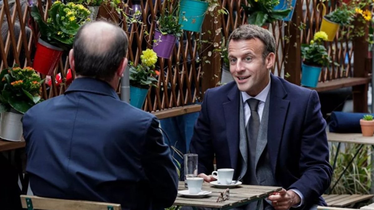 Macron at cafe with French Prime Minister Castex