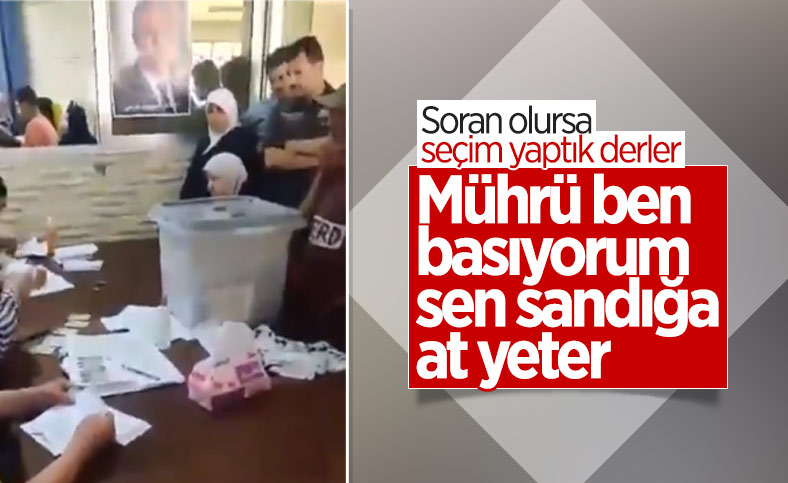 Suriye'de memurlar seçmen adına oy kullanıyor