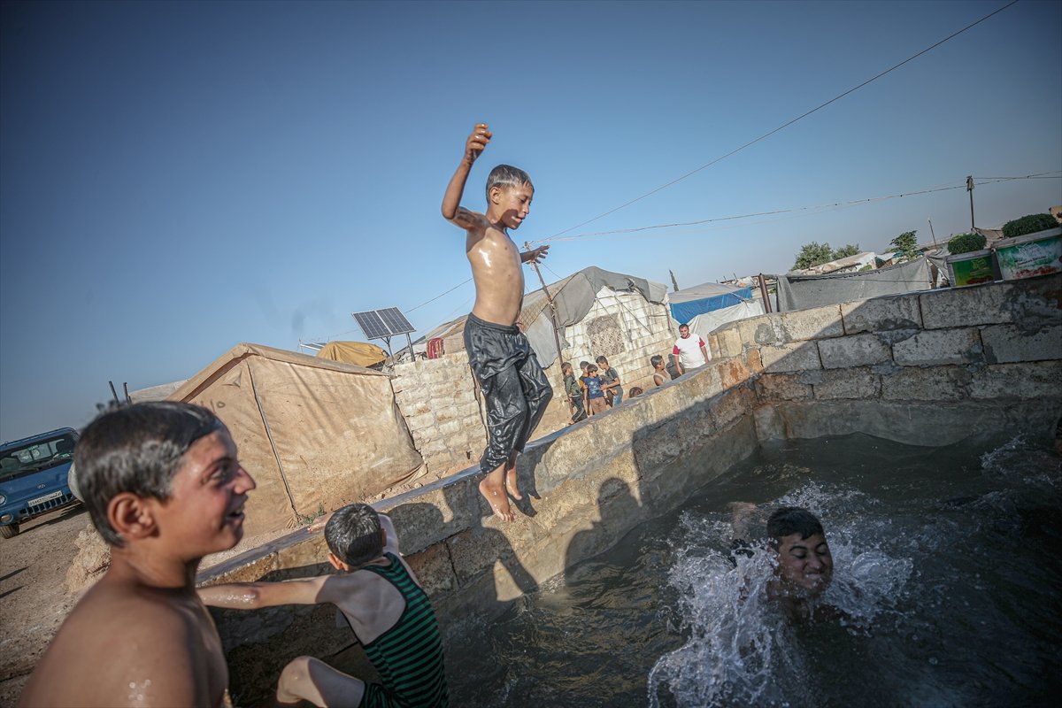 Syrian children enjoying the pool #11