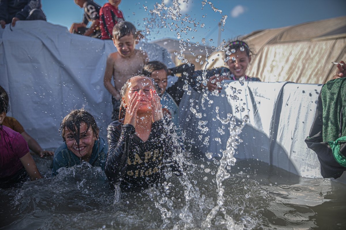 Syrian children enjoying the pool #6