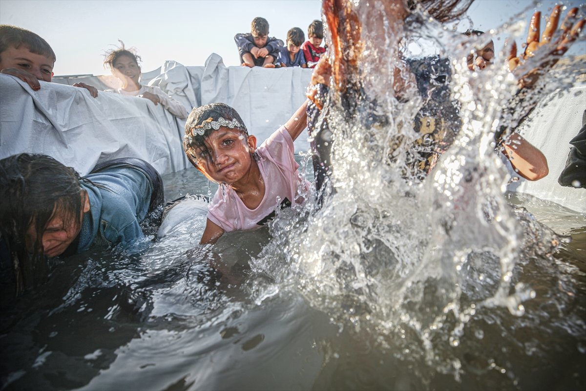 Syrian children enjoying the pool #3