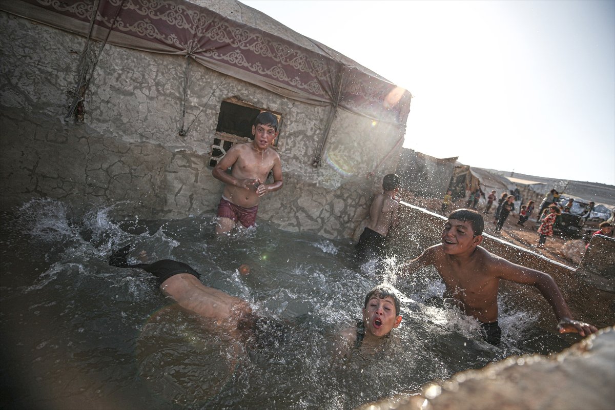 Syrian children enjoying the pool #7