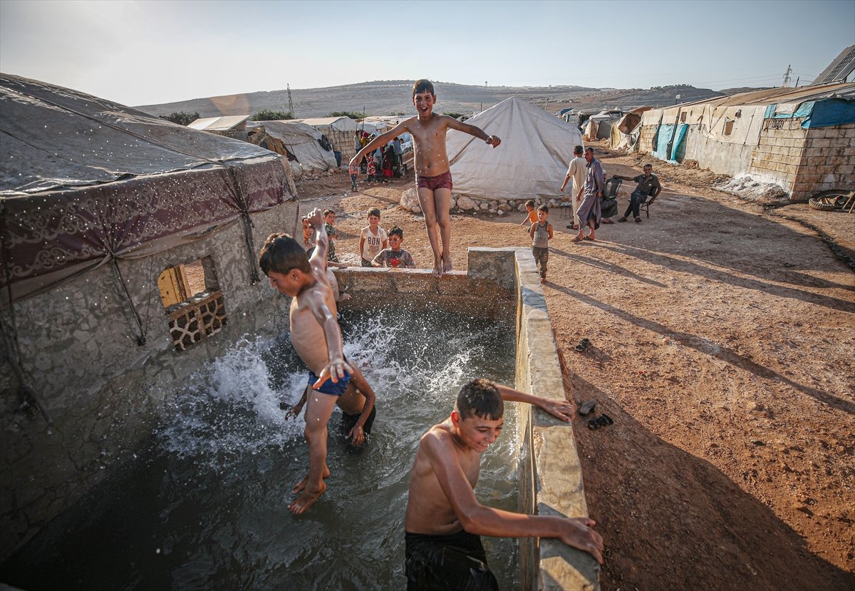 Syrian children enjoying the pool #10