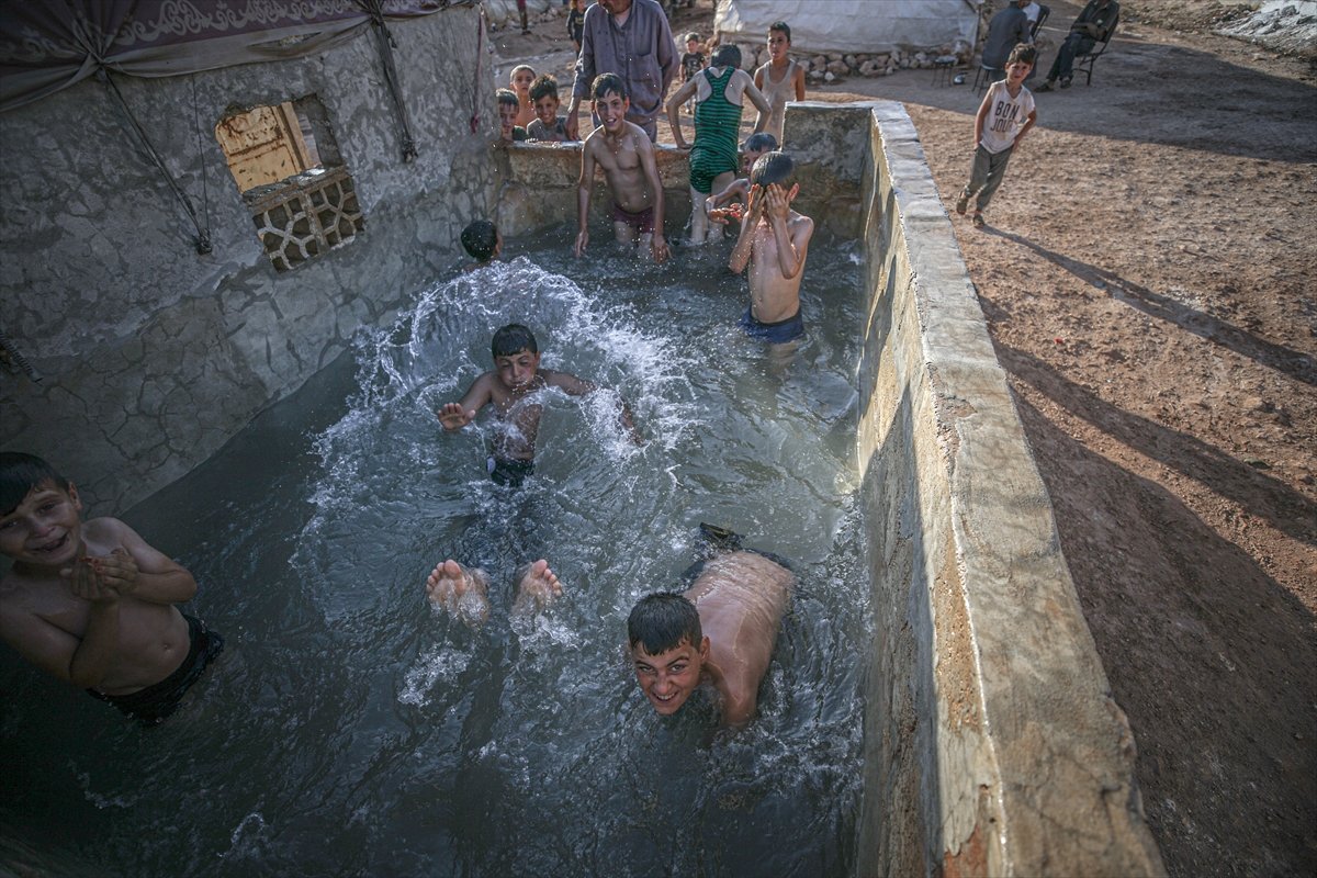 Syrian children enjoying the pool #9