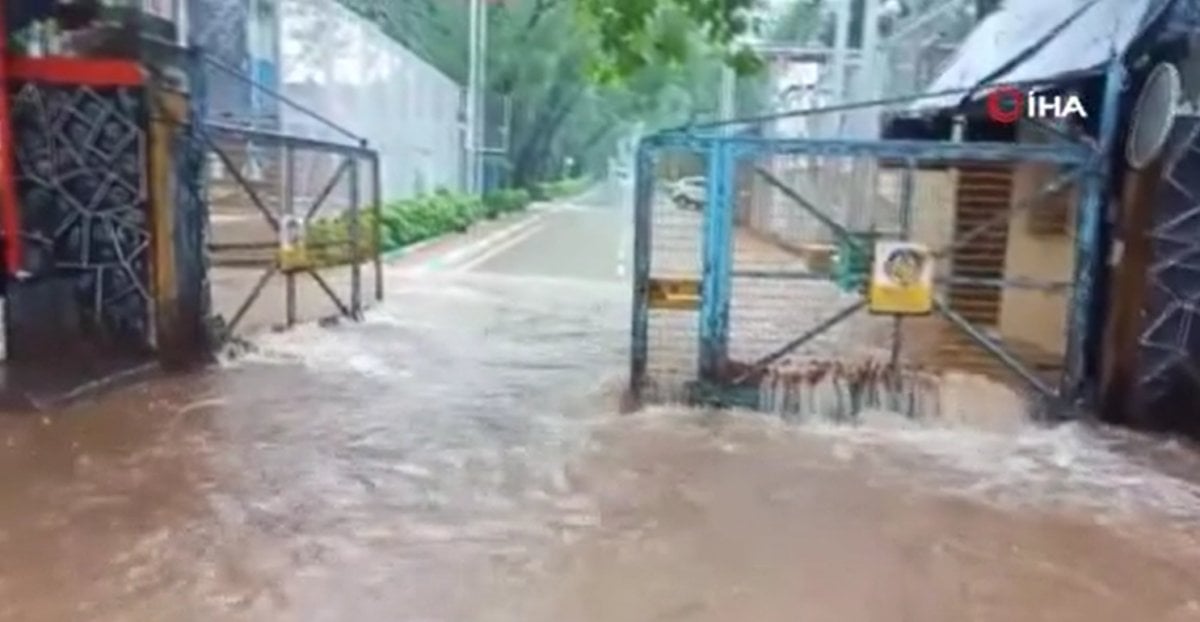Monsoon rains turn streets into lakes in India #2