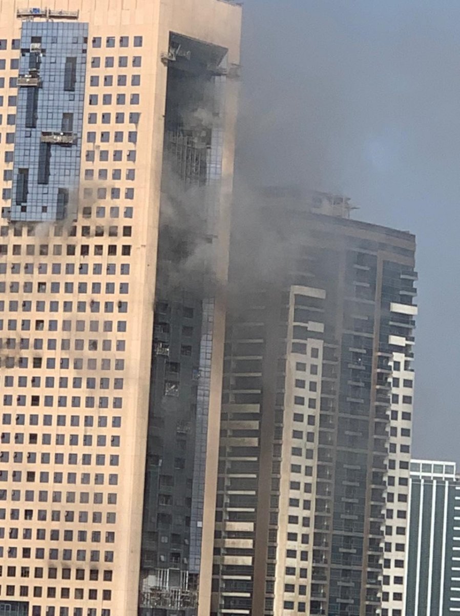 Upper floors of building under construction in UAE surrender to flames #2