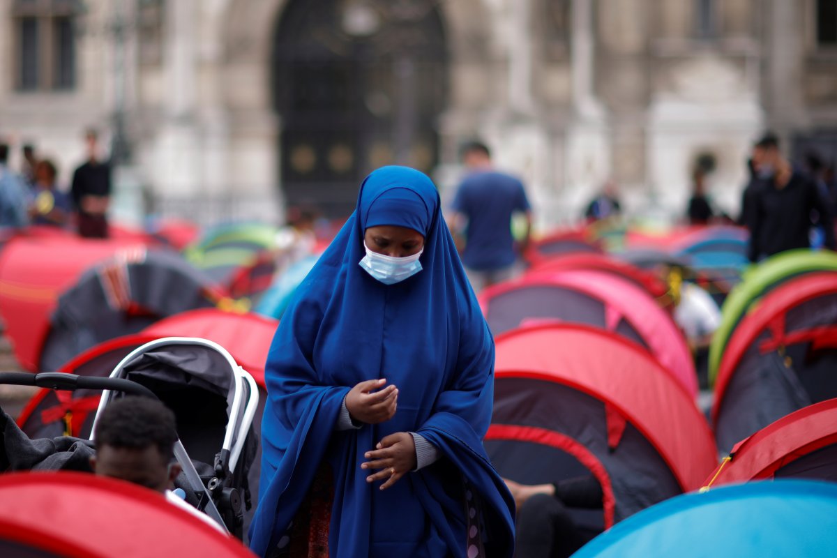 Immigrants set up tents in France #12