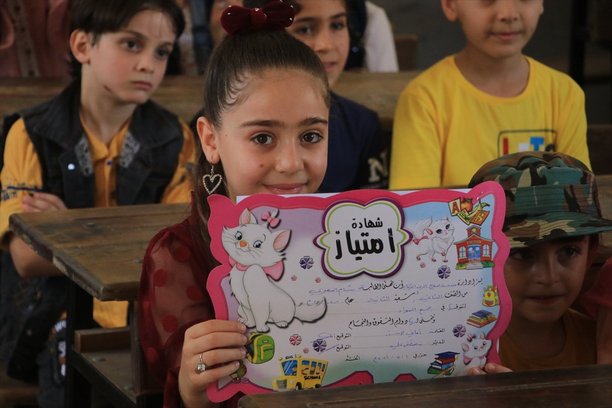 Report card joy in northern Syria #4