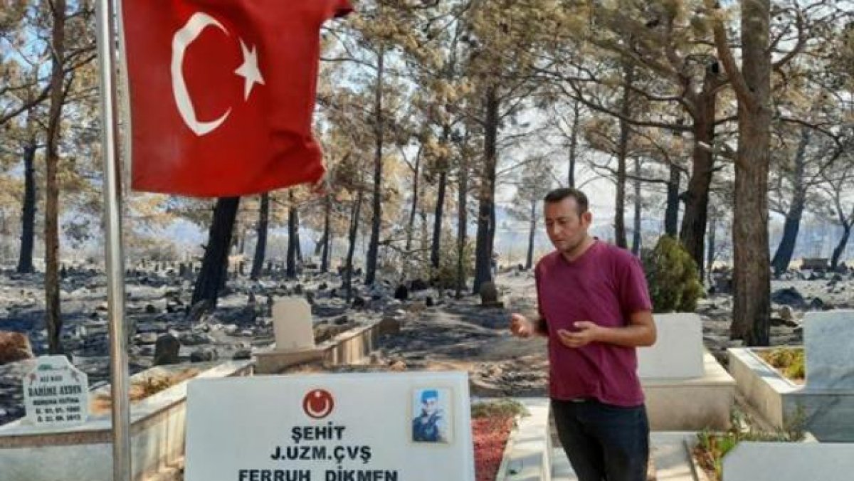 Mersin deki yangında zarar gören mezarlıkta şehit kabri ve Türk bayrağı yanmadı #4