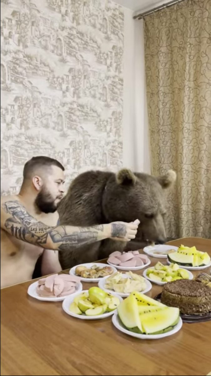 He ate with his bear and watched cartoons in Russia #1