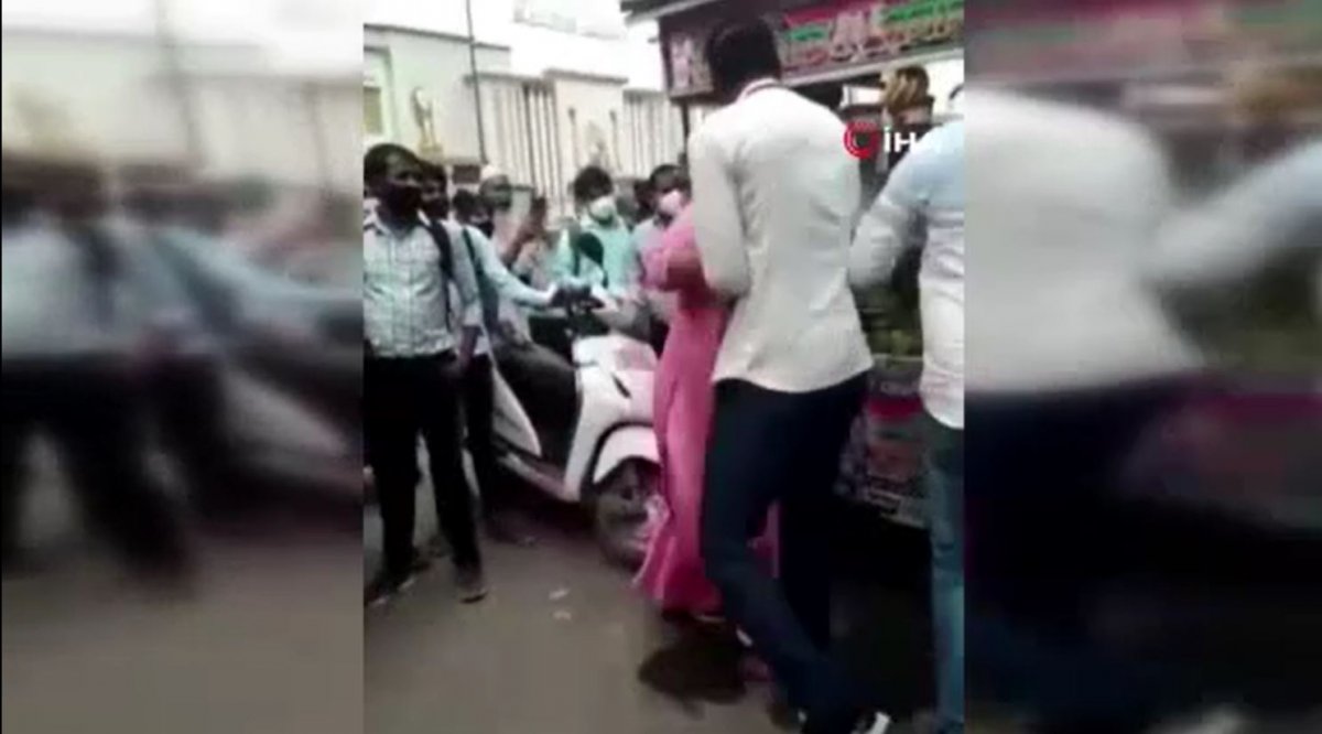 Unmasked women beat the man in charge in India #2