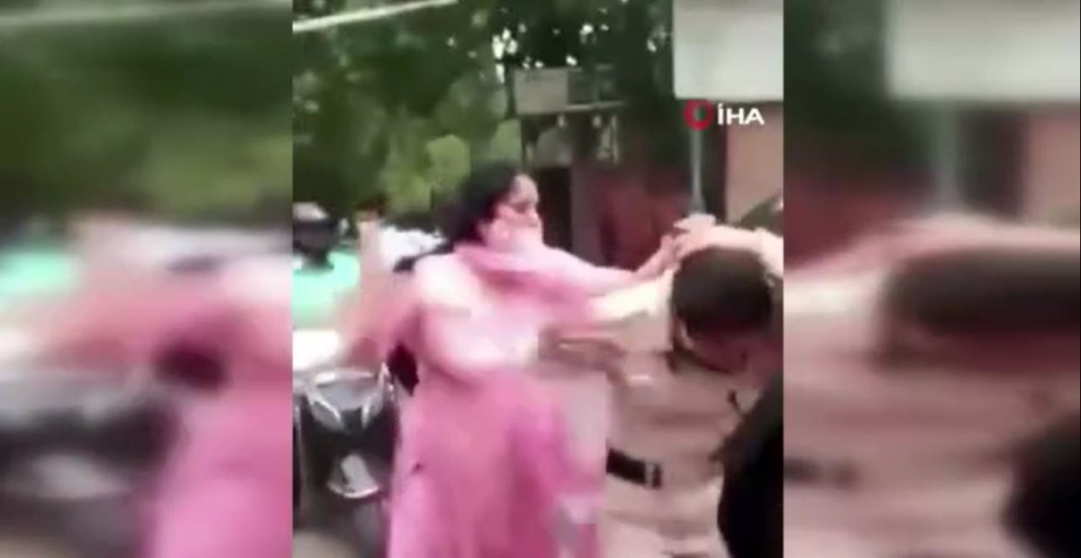 Unmasked women beat the man in charge in India #1