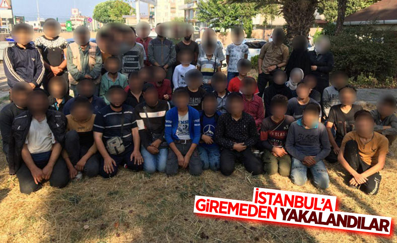 Kocaeli'de polisin durdurduğu araçta 50 kaçak göçmen yakalandı