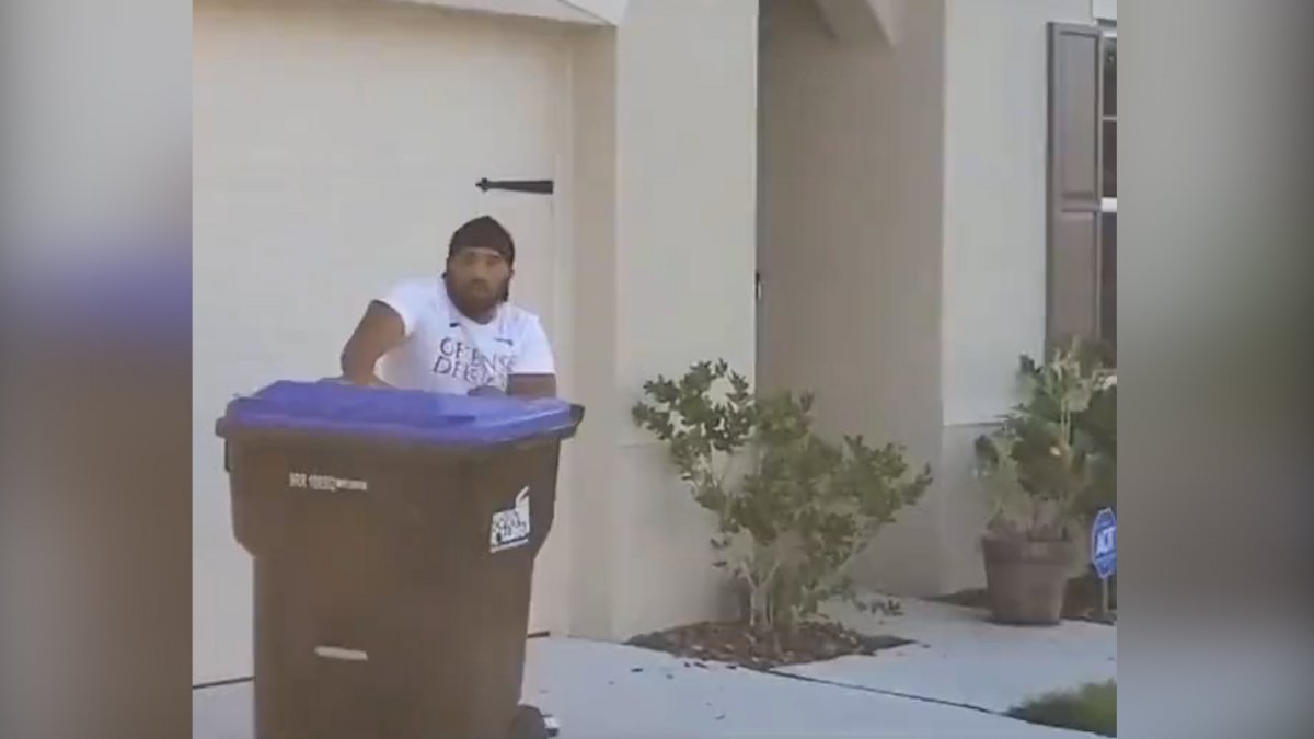 ABD de evinin bahçesine giren timsahı çöp bidonuyla yakaladı #5