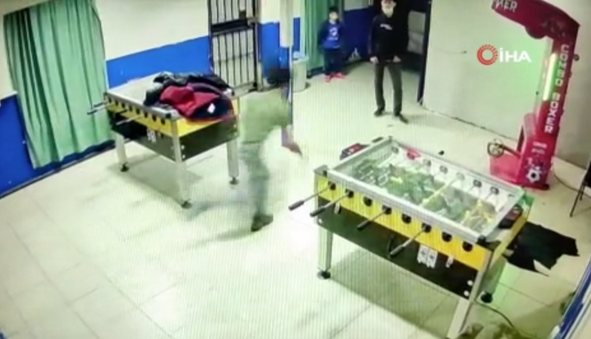 A young man in Istanbul is seen trying to hit the book machine #2