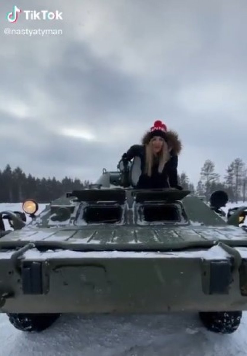 Ukrainian woman shoots video tutorial for captured Russian military vehicle #1