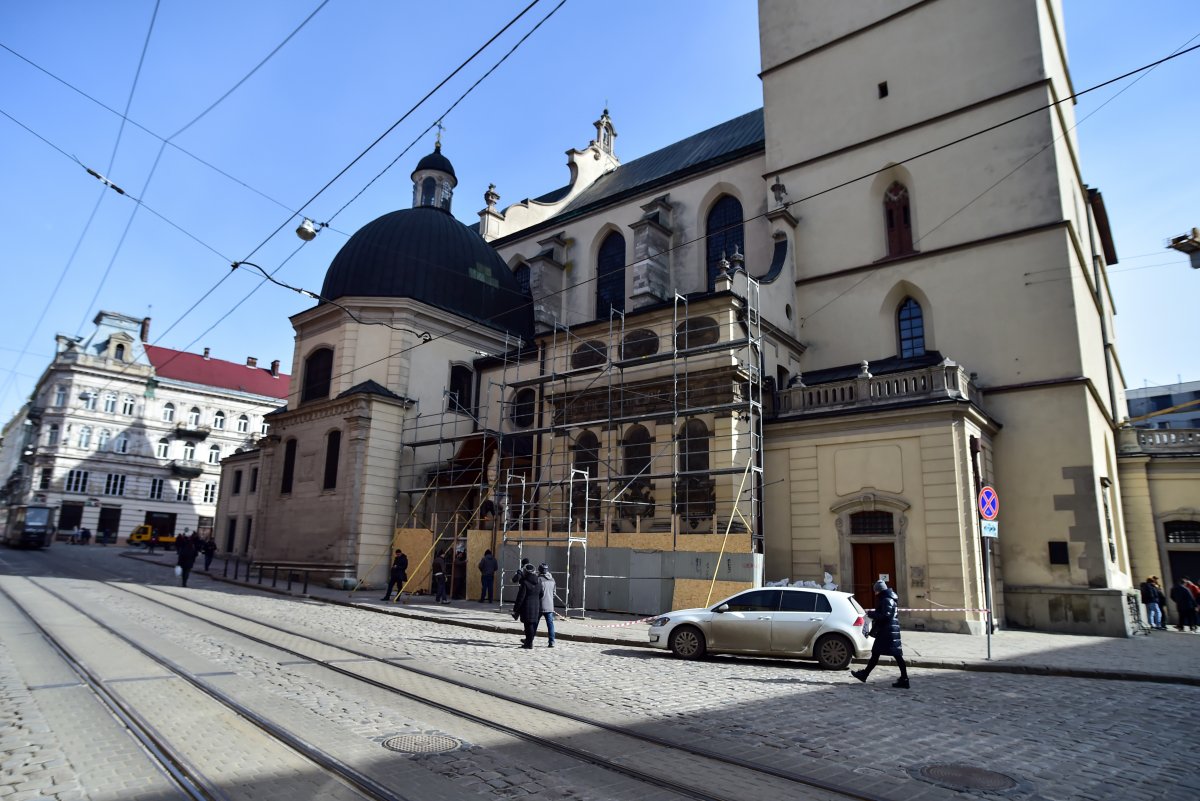 Latin Cathedral, showcases and statues are protected with wooden boards in Ukraine #1