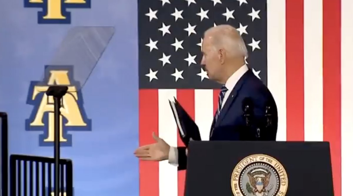 Joe Biden shakes hands with space #1
