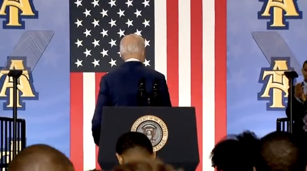 Joe Biden shakes hands with space #2