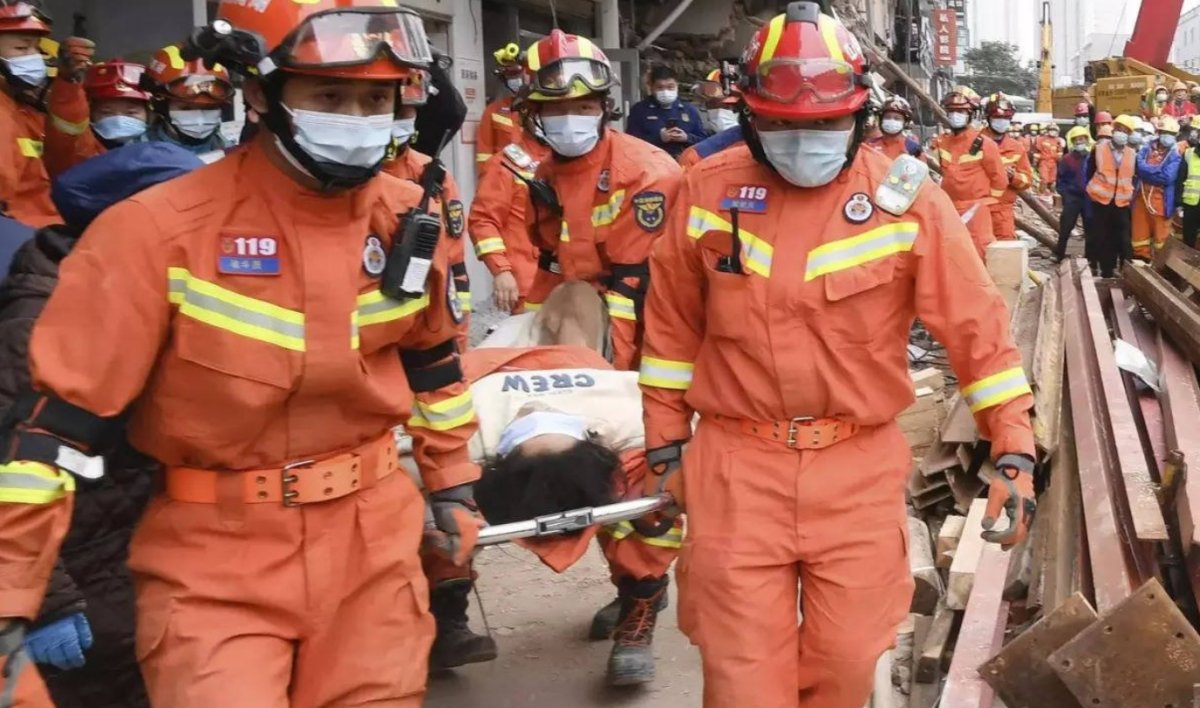 Woman rescued from building rubble 88 hours later in China #3