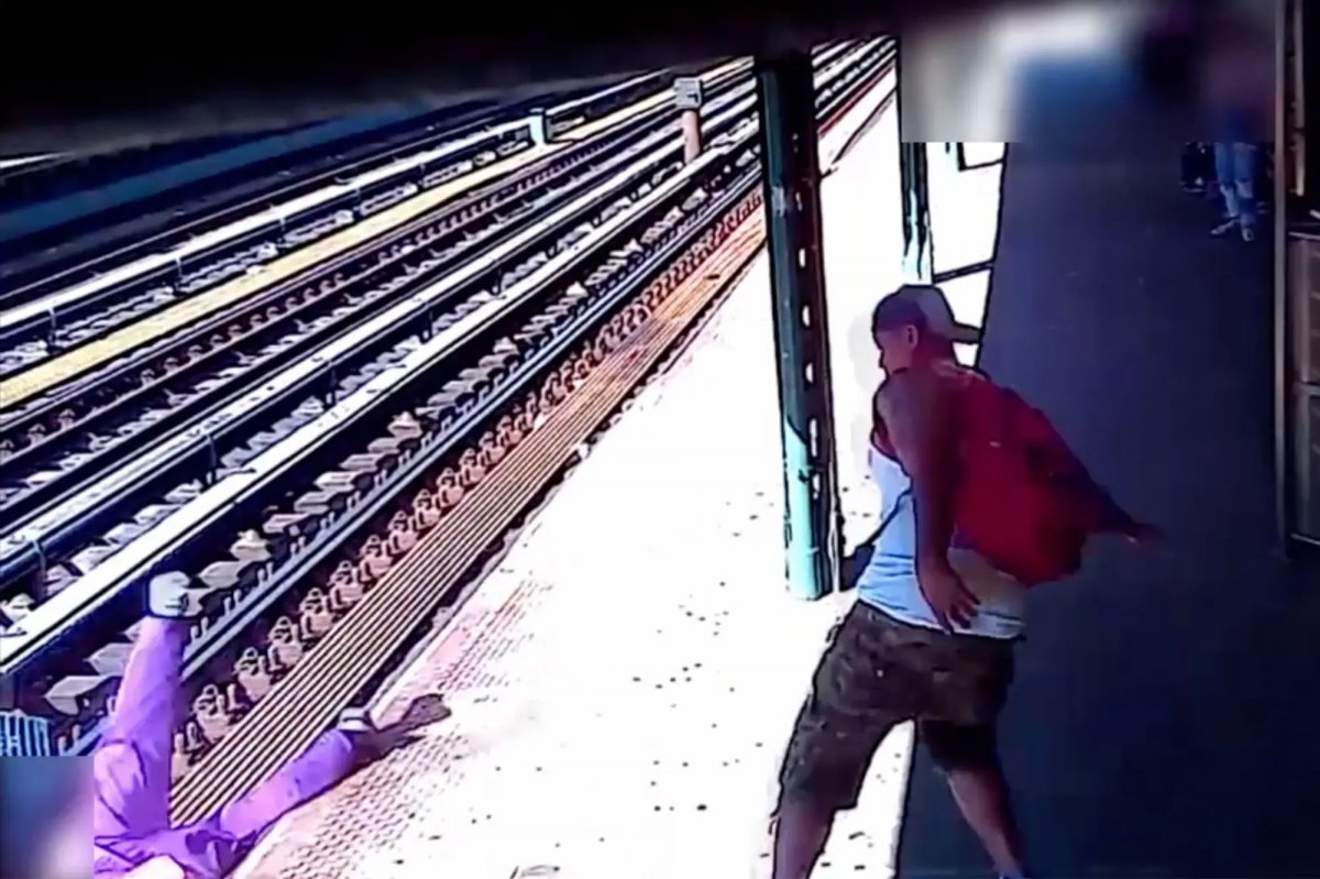 Woman pushed onto train tracks in USA #1