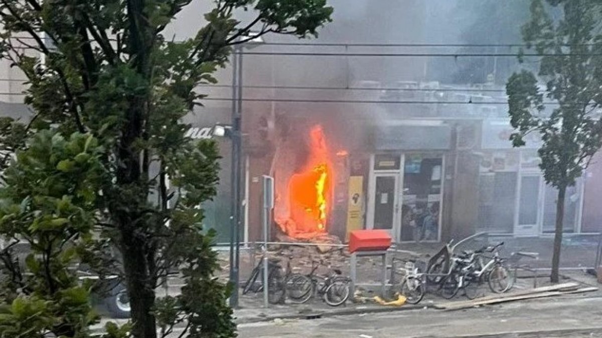 In the Netherlands, robbers blew up the ATM in the market they entered.