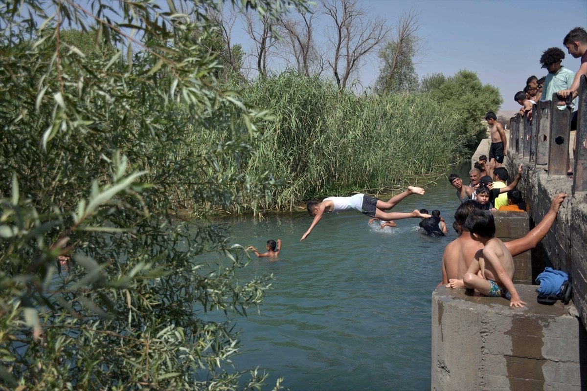 People in Sulaymaniyah enter the rivers to cool off #8