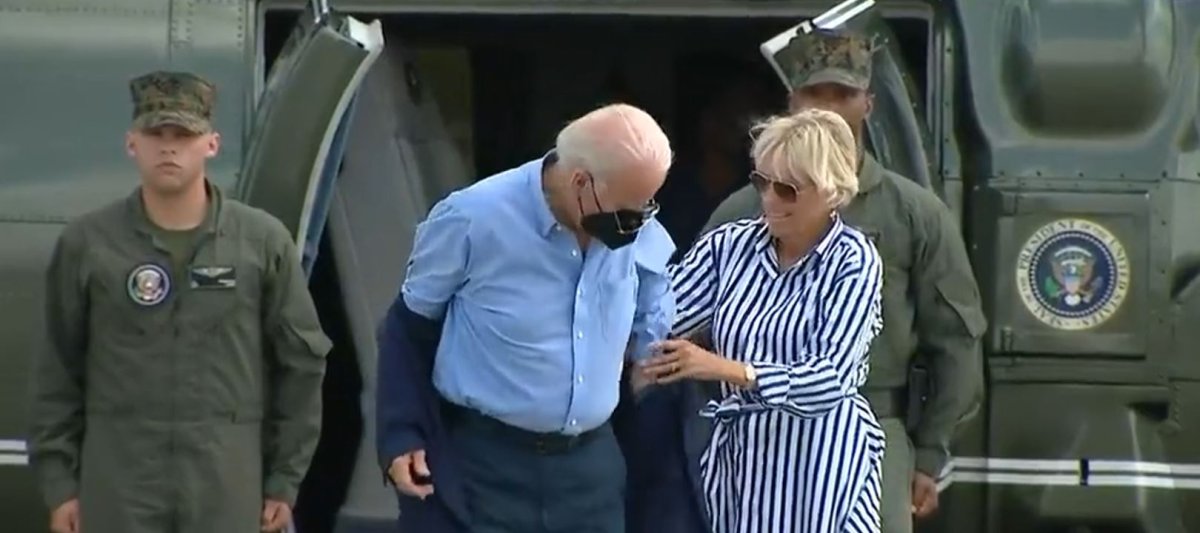 Unable to wear his jacket, Joe Biden drops his glasses #2